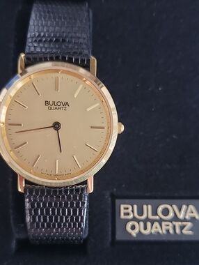 Bulova Men’s Gold Dial Quartz Watch with Black Leather Strap
